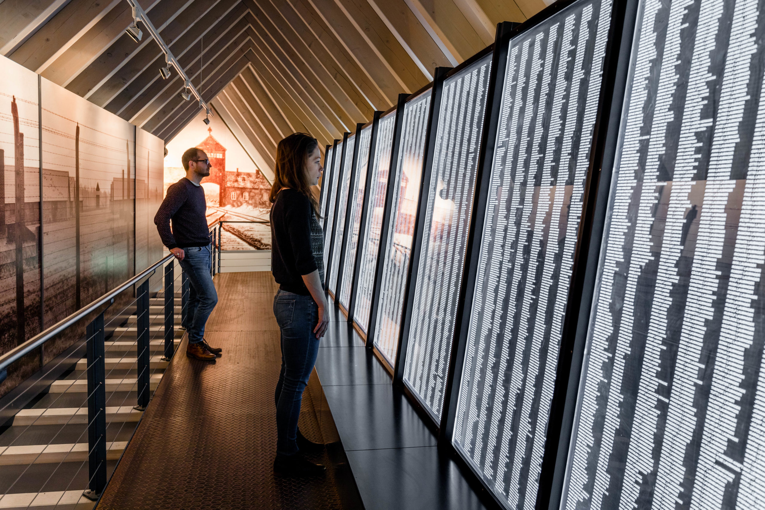 The last part of the permanent exhibition in Heidelberg. The tour ends on a walkway with a wall displaying the names of the more than 21.000 Sinti and Roma who were deported to Auschwitz-Birkenau, where almost all of them were murdered